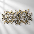 Intricate laser-cut geometric metal wall art in brushed gold and black finish